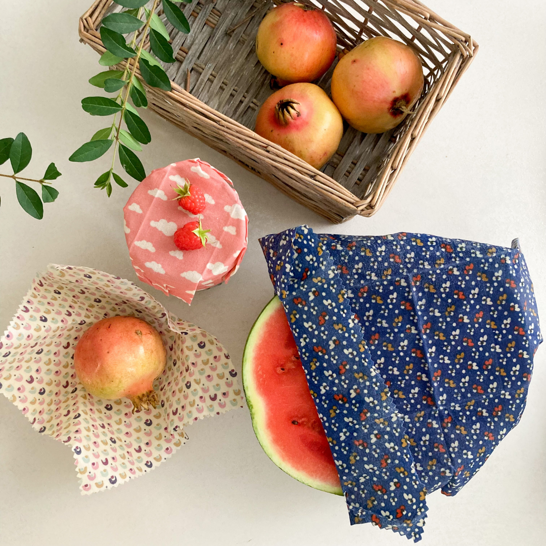 plastic-free beeswax wraps covering a watermelon and other fruit