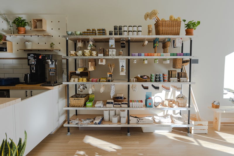 The shelves of lifestyle products in the Dartmouth Tare Shop.