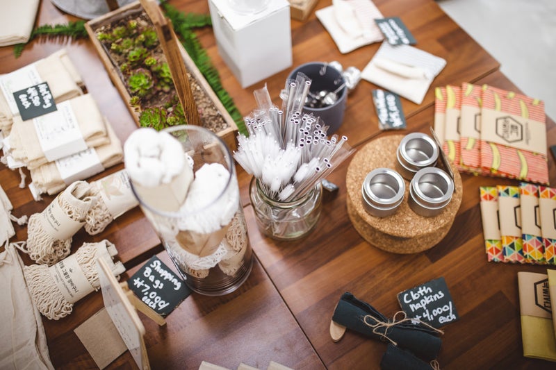 A table with various zero waste lifestyle products laid out
